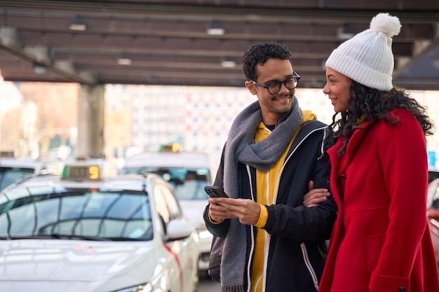 young couple ordering taxi using mobile app city 672594 11543